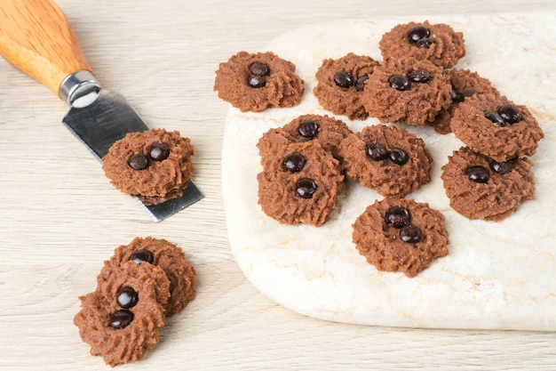 Chocolate chips cookies served on chopping board close up Popular to celebrate Eid al Fitr