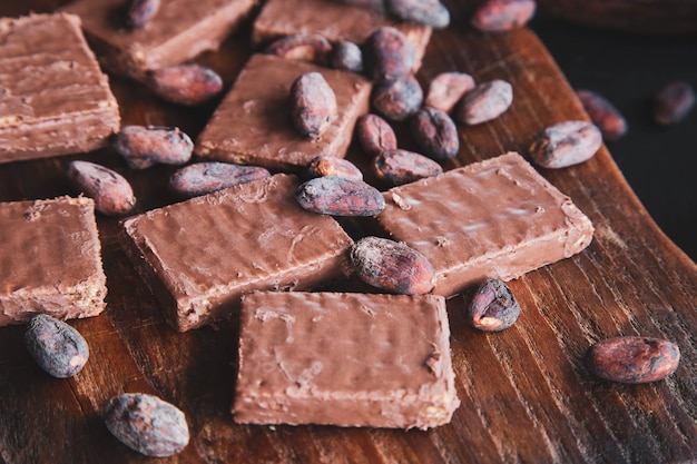 Chocolate and Cocoa Beans with Cocoa On a black