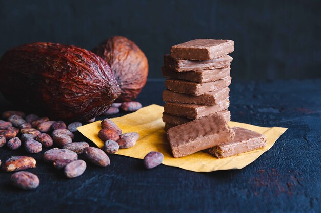 Chocolate and Cocoa Beans with Cocoa On black