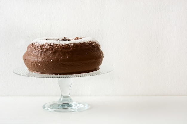 Chocolate and coconut cake copy space