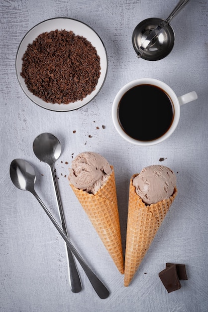 Chocolate coffee ice cream in a waffle cone