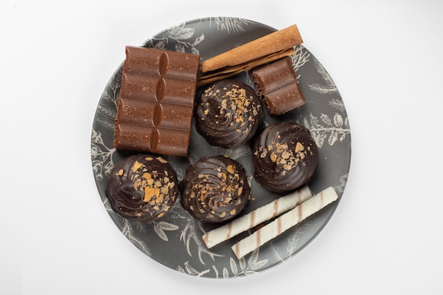 Chocolate cookies on a black platter