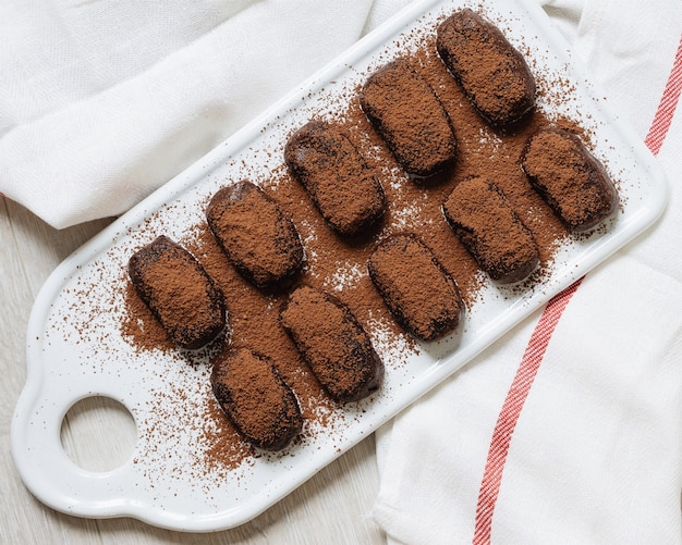 chocolate and cookies. chocolate cake. white background and towel 