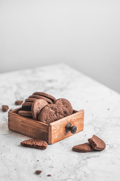 chocolate cookies stacked on table