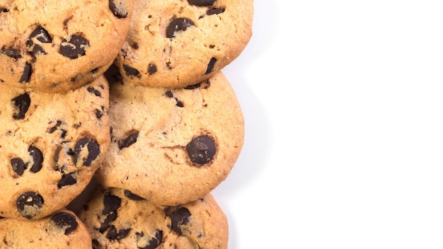 Chocolate cookies at the white background with a breaking trace