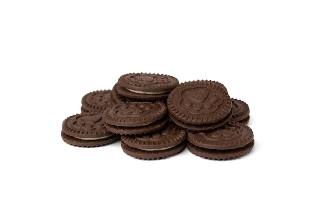 Chocolate cookies with milk filling isolated on white