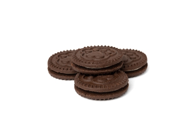 Chocolate cookies with milk filling isolated on white