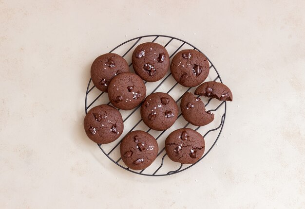 Chocolate cookies with salt and pieces of chocolate. Homemade pastries. Recipe. Vegetarian food.