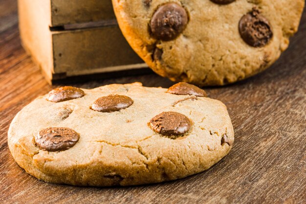 Chocolate cookies on wooden table. Close-up. Selective focus