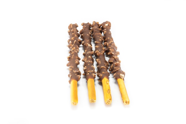 Photo chocolate covered poky sticks on white