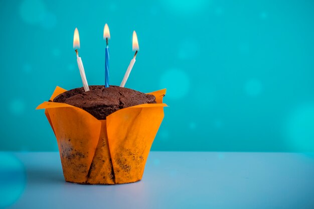 Chocolate cupcake with candles