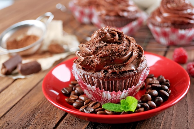 Chocolate cupcakes on saucer closeup