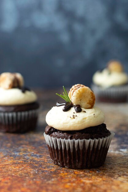 Chocolate cupcakes with butter cream. Sweet dessert, bakery, pastry dessert.