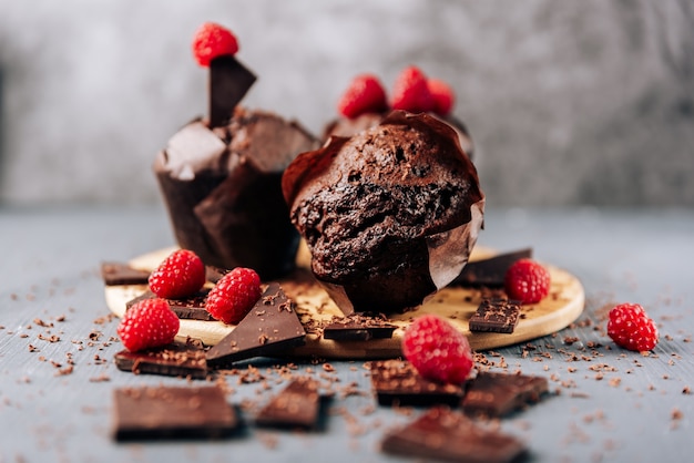 Chocolate cupcakes with raspberries