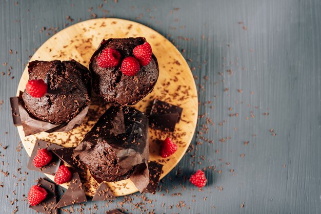 Chocolate cupcakes with raspberries