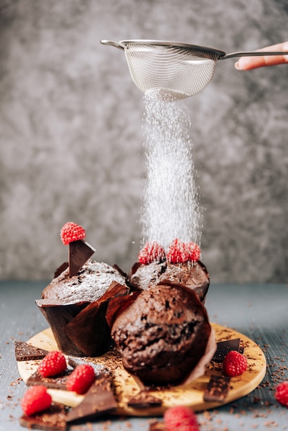 Chocolate cupcakes with raspberries