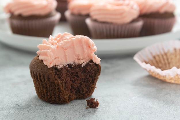 Chocolate cupcakes with strawberry buttercream