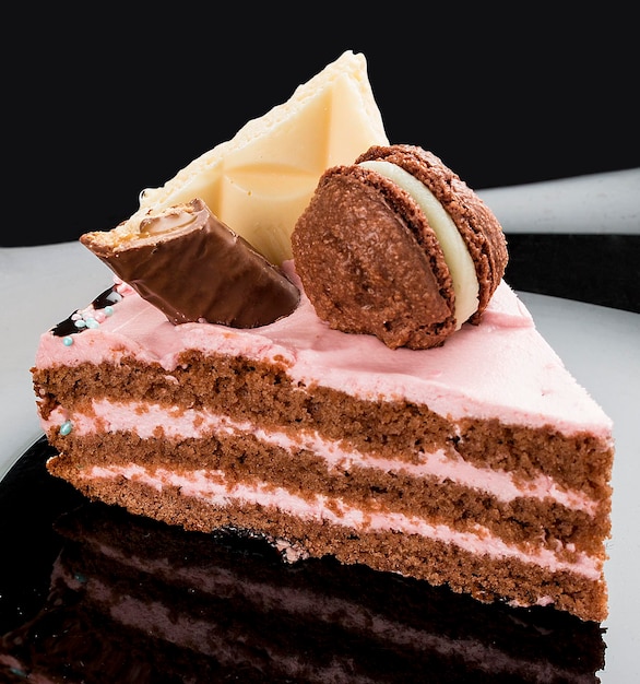 Chocolate dessert with currants on a dark background