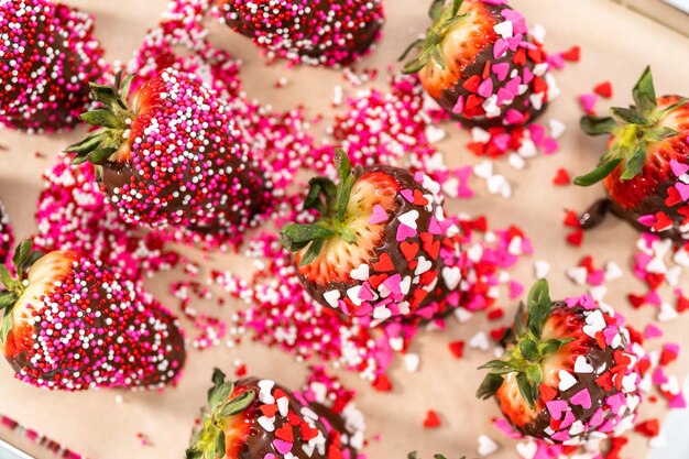 Chocolate dipped strawberries covered with sprinkles