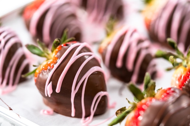 Chocolate dipped strawberries drizzled with melted chocolate