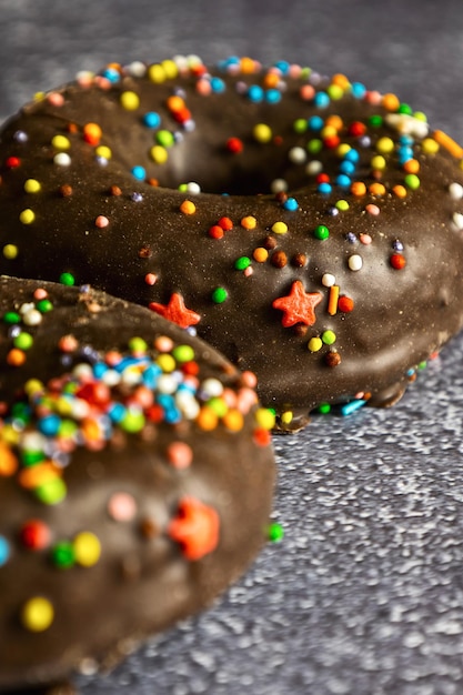 Chocolate donuts with glaze selective focus