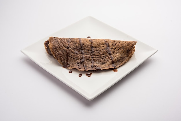 La dosa al cioccolato è una ricetta indiana speciale per bambini, può essere servita a colazione o come spuntino.