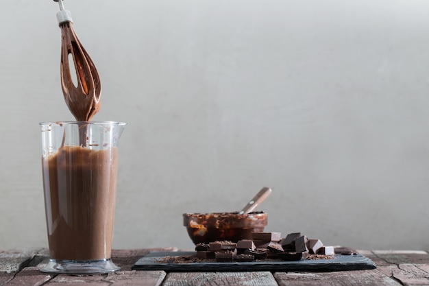 Photo chocolate dough in a mixer