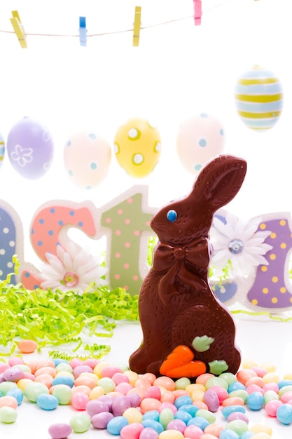 Chocolate Easter bunny with other Easter  candies.