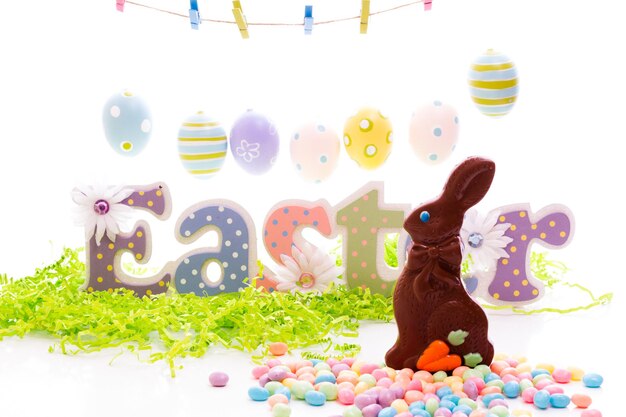 Chocolate Easter bunny with other Easter  candies.