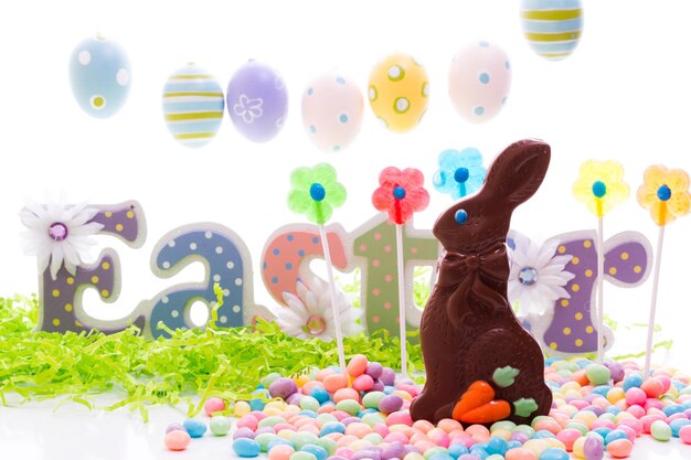 Chocolate Easter bunny with other Easter  candies.