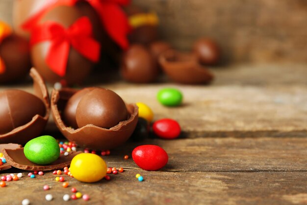 Chocolate Easter eggs on wooden background