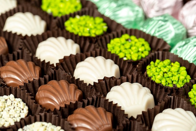 Chocolate fine chocolate varieties with white dark and milk chocolate praline chocolate sweets close up