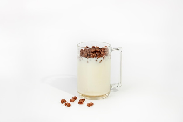 Chocolate flakes in a glass cup with yogurt healthy breakfast