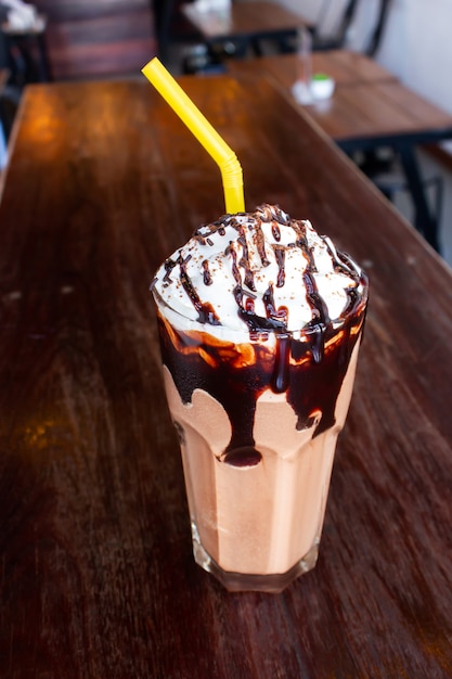 Chocolate frappé served with whipped cream and chocolate syrup. 