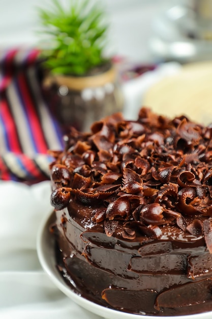 Chocolate Fudge Cake served on food table top view cafe bake dessert