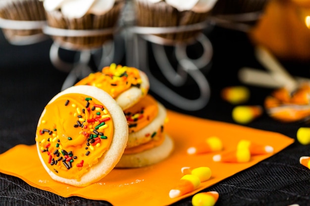 Chocolate Halloween cupcakes with white buttercreme icing and chocolate shavings on top.