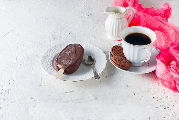 Chocolate ice cream and a cup of coffee