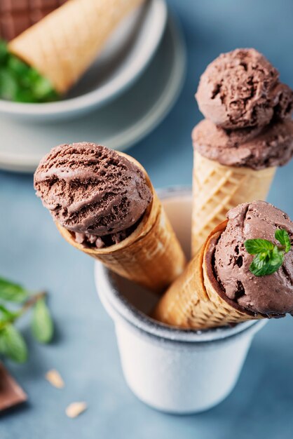 Chocolate ice cream on ice cream cones