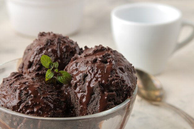 Chocolate ice cream with liquid chocolate.