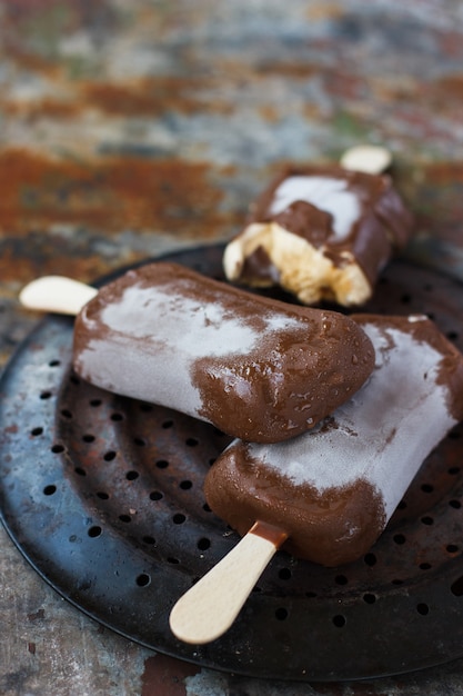 Chocolate ice-creamchocolate ice cream on a rusty background