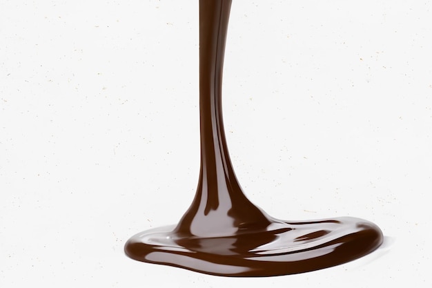 Foto un liquido al cioccolato con uno sfondo bianco