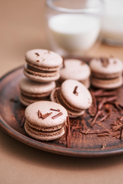 Chocolate macarons with chocolate filling French meringue cookies macaron