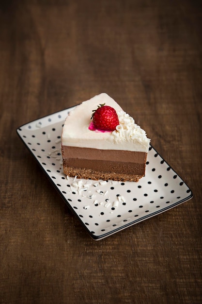 Chocolate mousse cheesecake dessert sweet food portion\
slice