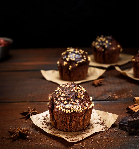 Chocolate muffins on a brown  