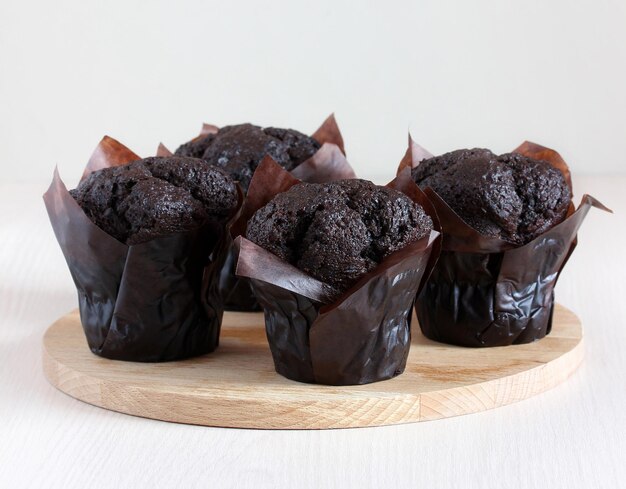 Chocolate muffins on the table. sweet dessert, treats, cakes. copy space.