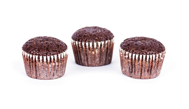 Chocolate muffins on white background