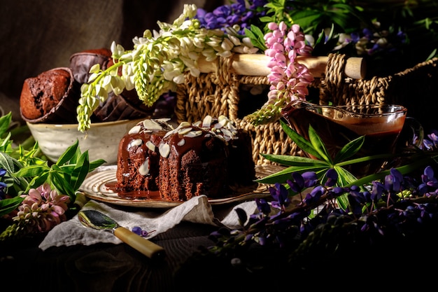 Chocolate muffins on a wooden background