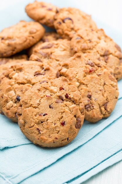 Chocolate oatmeal cookies on the  wooden background.