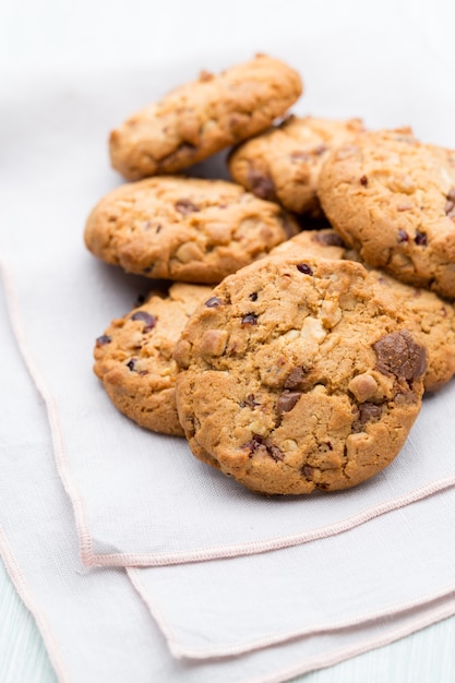 Chocolate oatmeal cookies on the  wooden background.