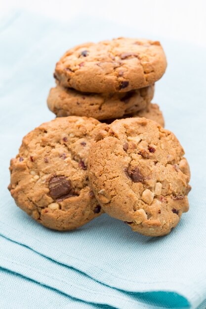 Chocolate oatmeal cookies on the  wooden surface.